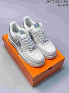 Nike Air Force 1 ’07 Low Monogram Sneakers, White and Navy