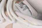 Nike SB Dunk Low Sneakers in White and Soft Pink