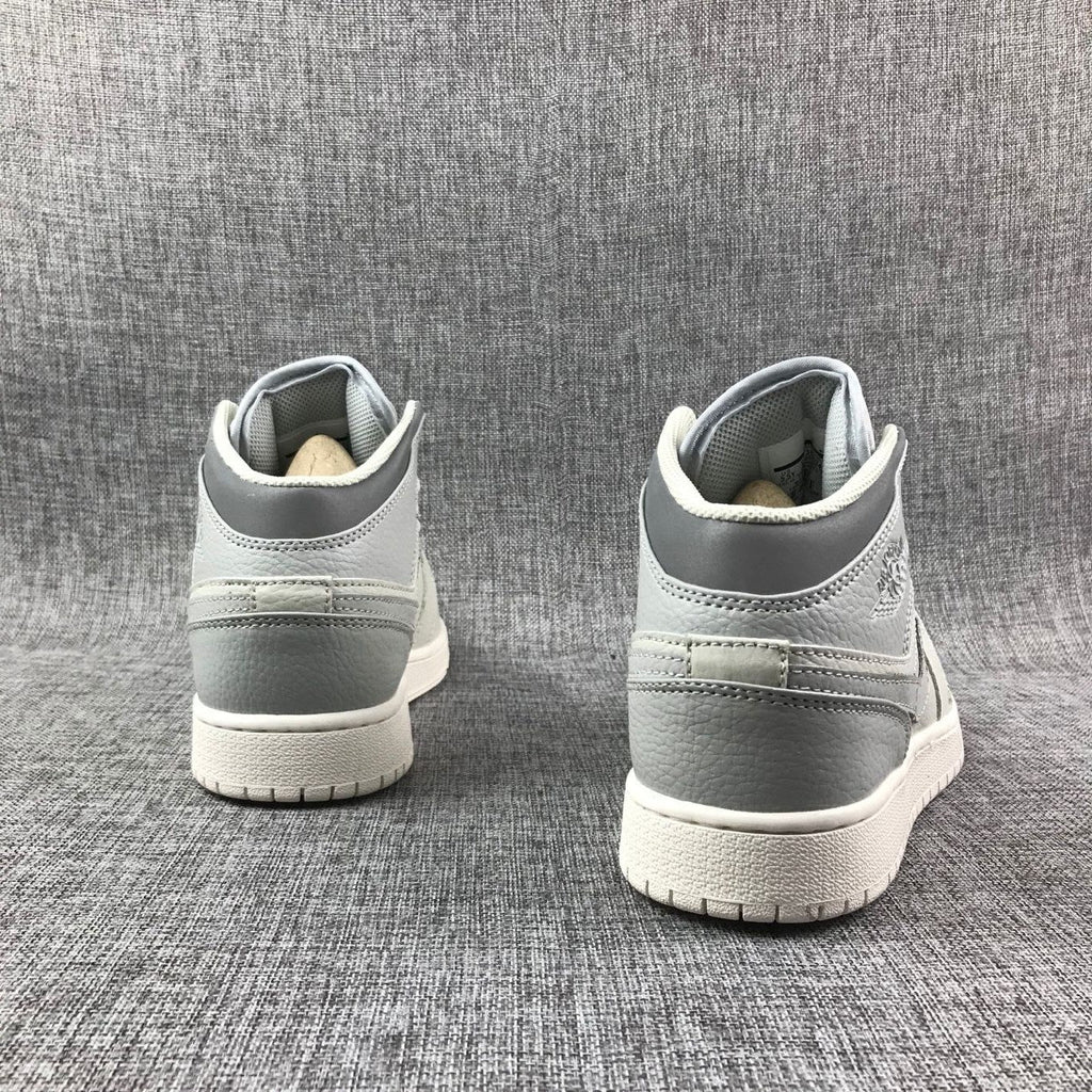 Air Jordan 1 Mid Sneakers in White and Grey