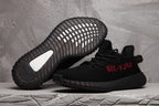 Yeezy Boost 350 V2 Black Knit Sneakers with Red Accents