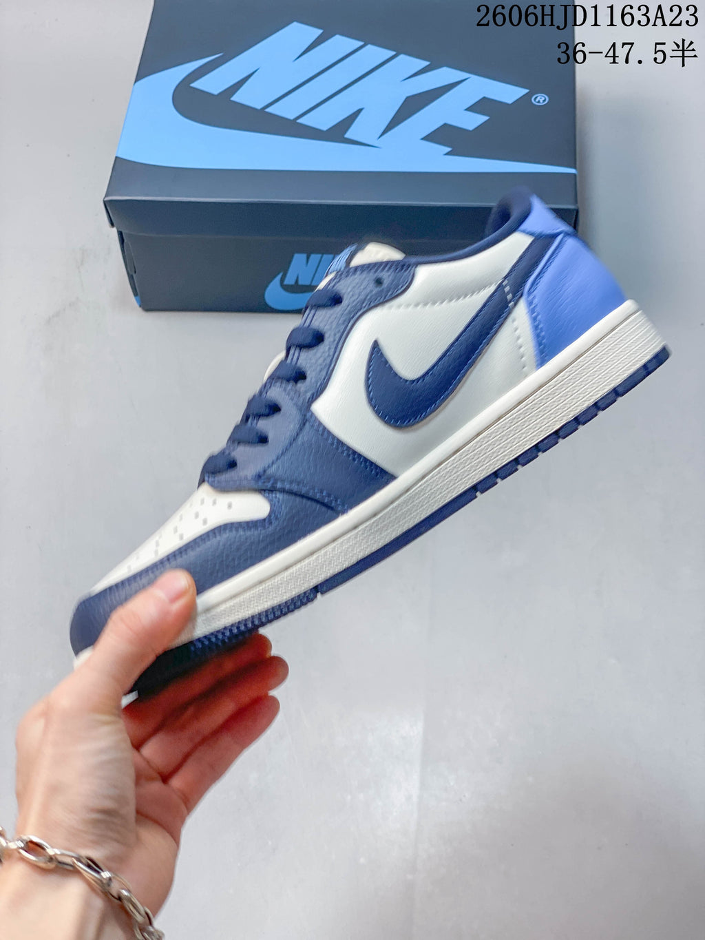 Jordan Air Jordan 1 Low Sneakers in Blue and White