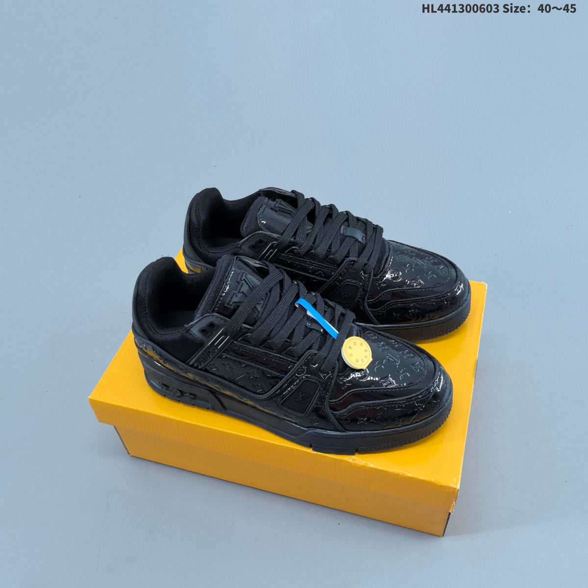 Louis Vuitton Trainer Low-Top Sneakers in Black and White