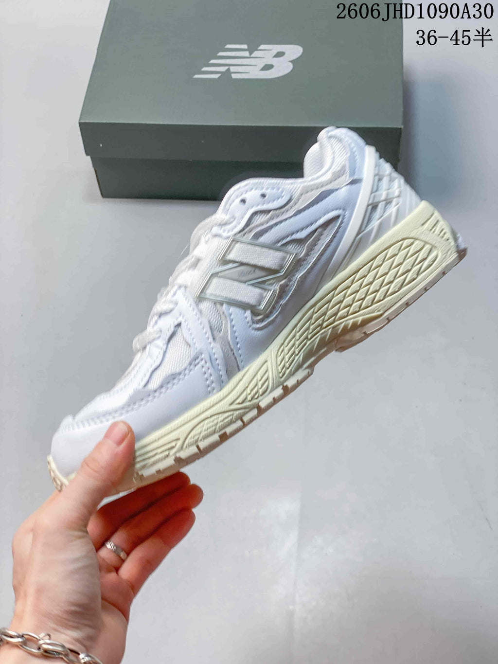 New Balance M1906R Sneakers in White and Silver