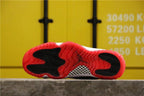 Air Jordan 11 Retro Bred Black and Red High-Top Sneakers