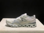 On Cloud X 4 AD Sneakers in Wolf/Alloy Light Gray
