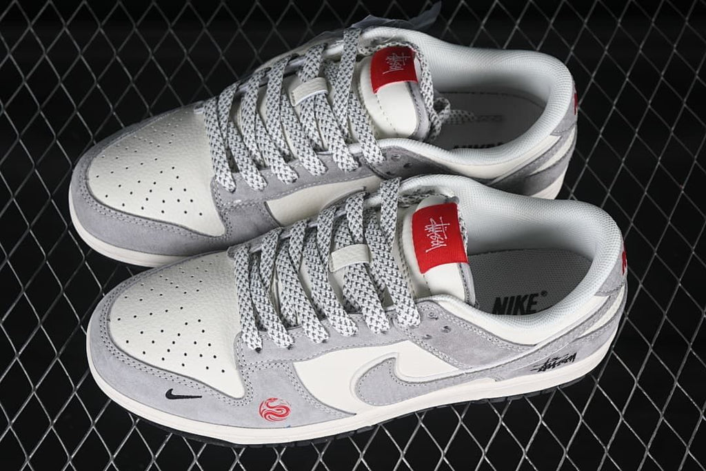 Nike SB Dunk Low Stüssy Snake Year Gray and Off-White Sneakers