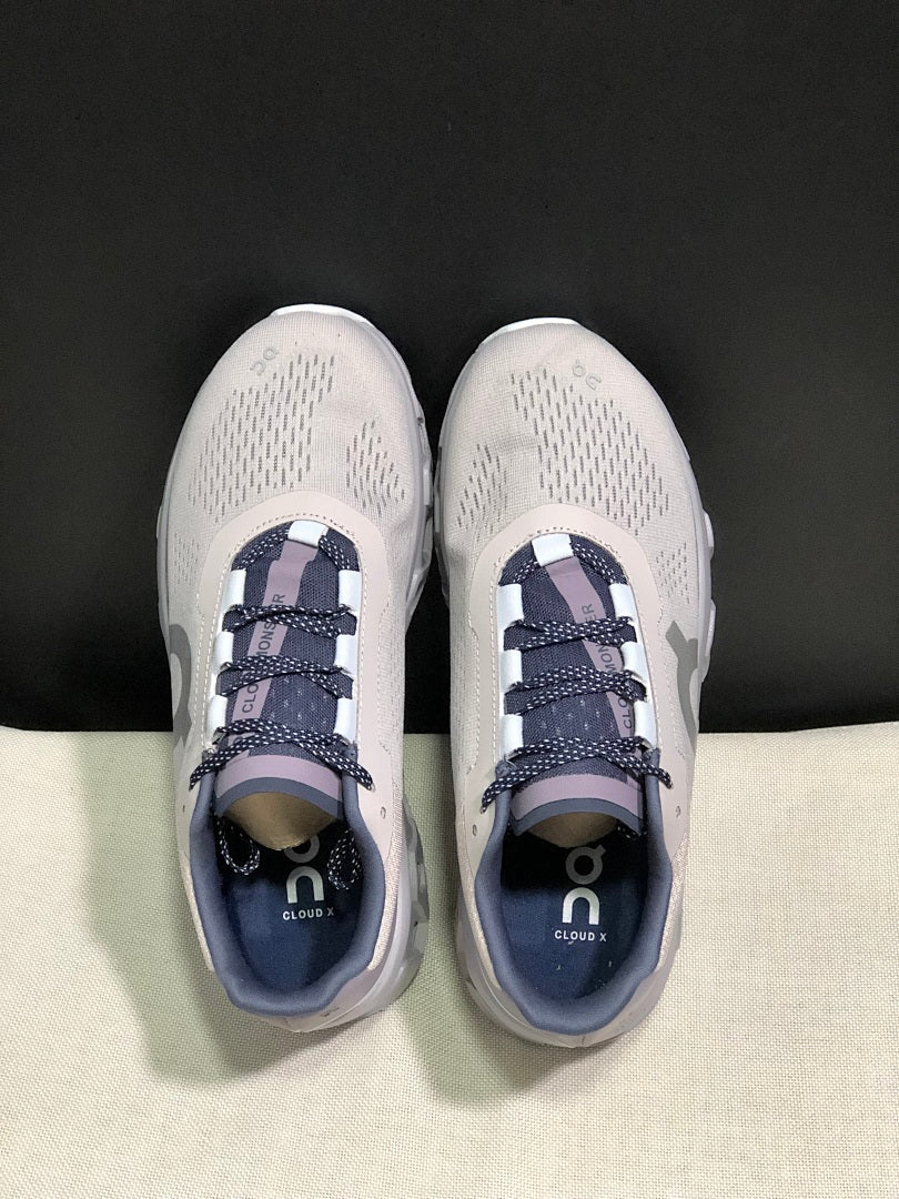 On Cloudmonster Sneakers in Gray and Purple