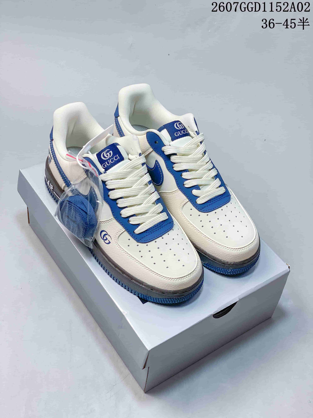 Nike Air Force 1 Low Monogram Sneakers in White and Grey