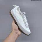 Miu Miu Tyre Low-Top Sneakers in Black or White