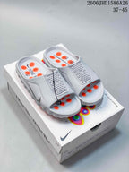 Nike Mind 001 Slide Sandals in White and Orange