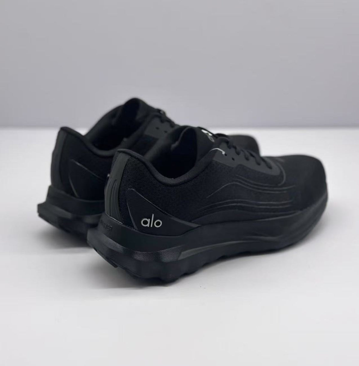 Alo All-Black Lace-Up Sneakers