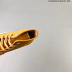 Converse Chuck 70 High Top Sneakers in Mustard