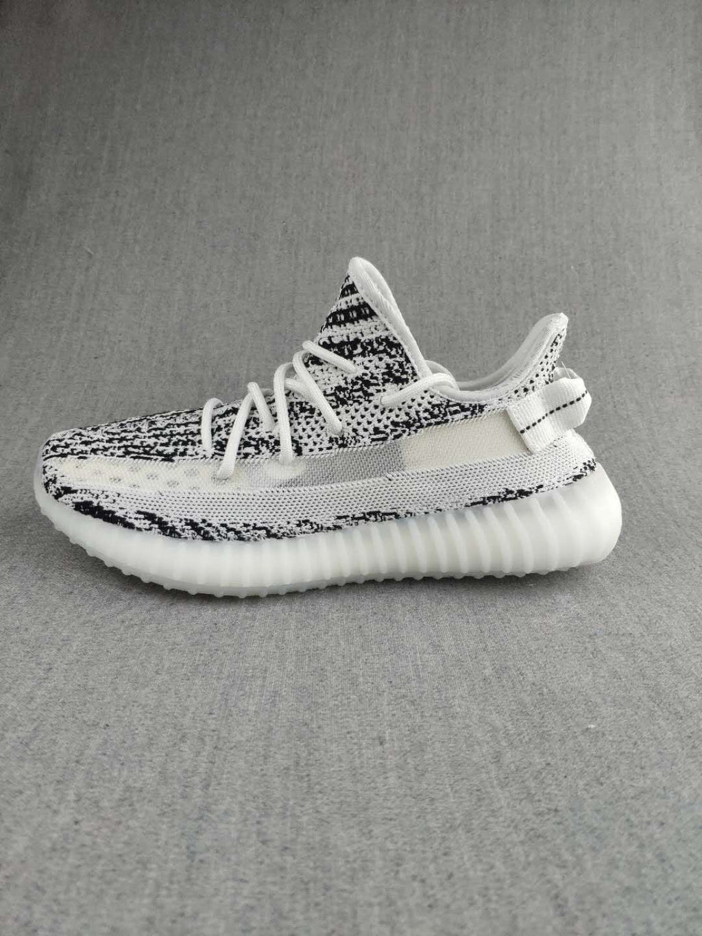 Yeezy 350 V2 Knit Sneakers in Black and White