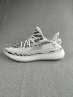 Yeezy 350 V2 Knit Sneakers in Black and White