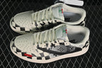 Jordan 1 Low Black and White Checkered Sneakers