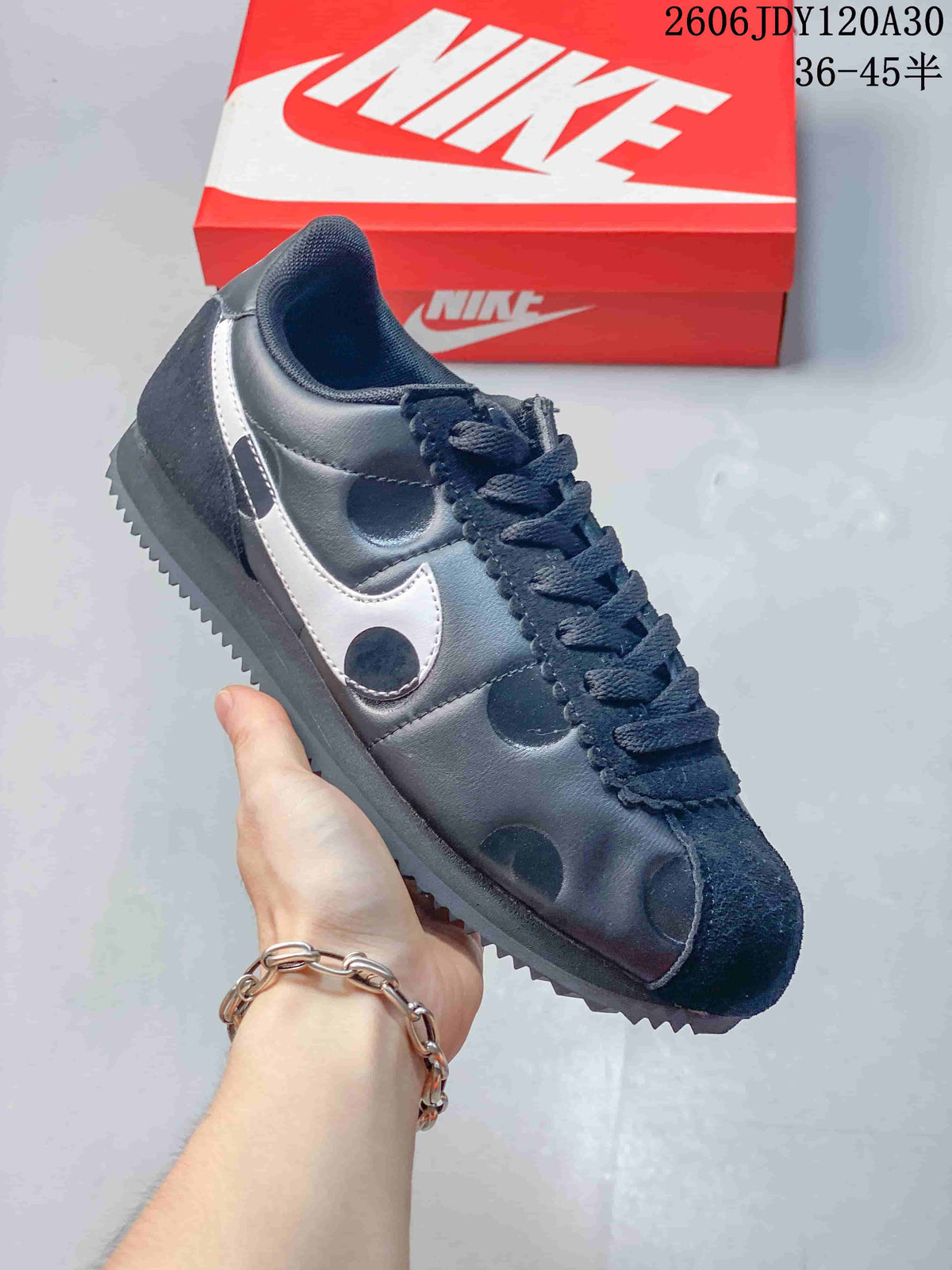 Nike Classic Cortez Sneakers in Black and Silver