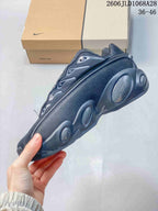 Nike NOCTA Glide Black/White Low-Top Sneakers