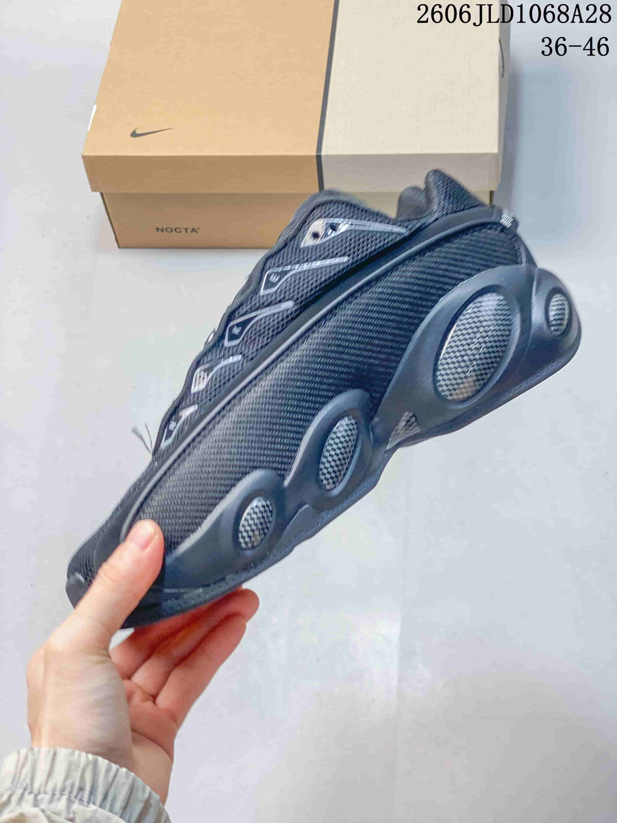 Nike NOCTA Glide Black/White Low-Top Sneakers