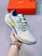 Nike Pegasus 38 Running Shoes in White, Blue and Green