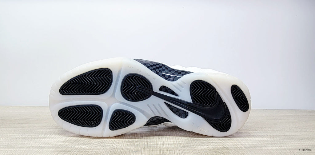 Nike Air Foamposite One High-Top Sneakers in Black, White and Blue