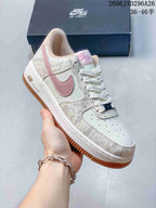 Nike Air Force 1 ’07 Low Sneakers in White and Pink