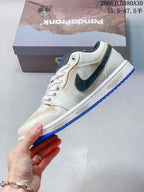 Jordan AJ1 Low Panda Prank Sneakers in White and Blue
