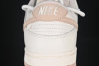 Nike SB Dunk Low Sneakers in White and Soft Pink