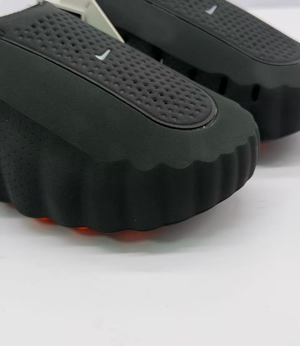 Nike Black Slides with Orange Pod Sole