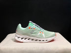 On Cloudsurfer Sneakers in Pale Green and White