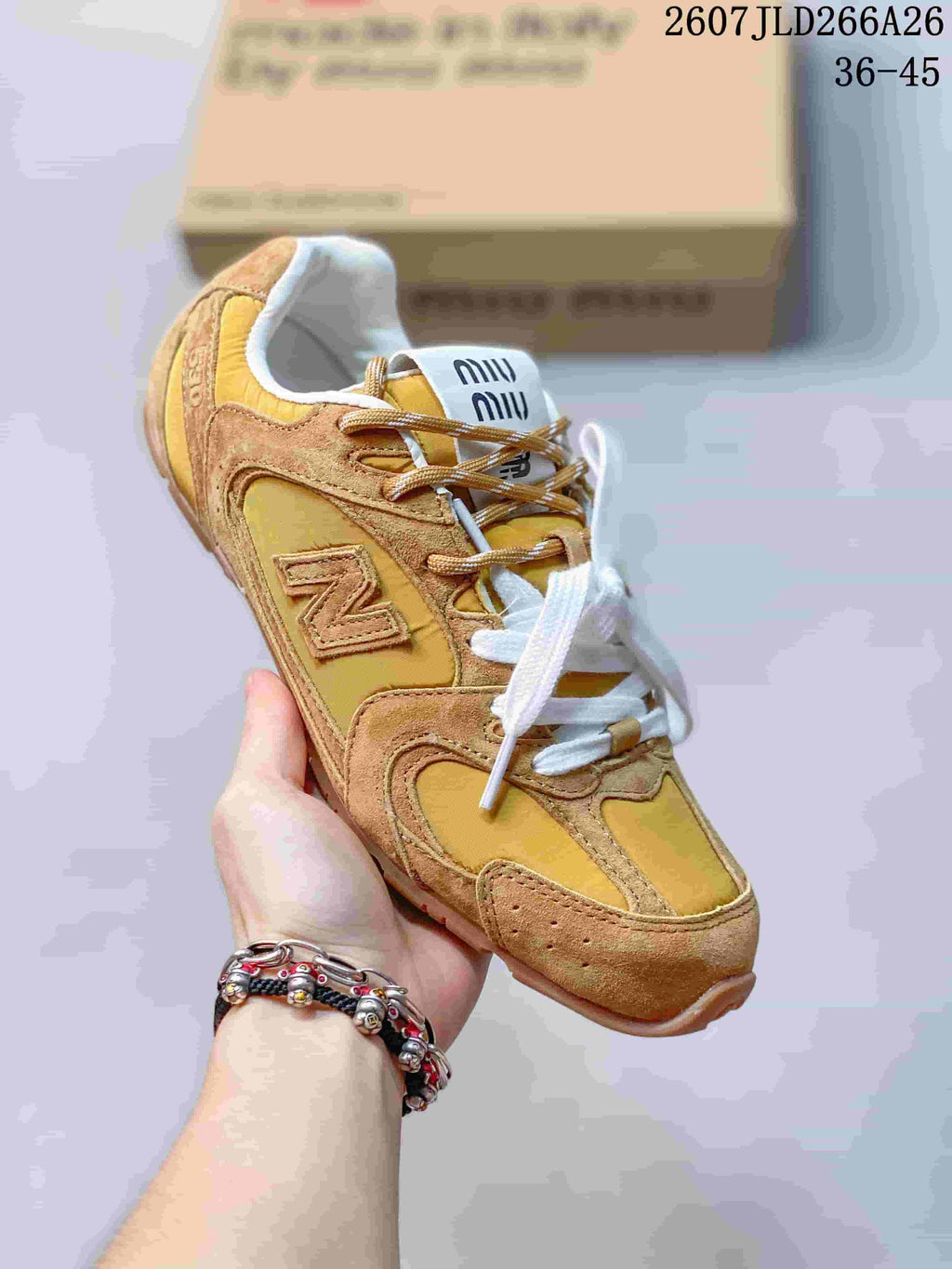 Miu Miu x New Balance 530 SL Mustard Sneakers