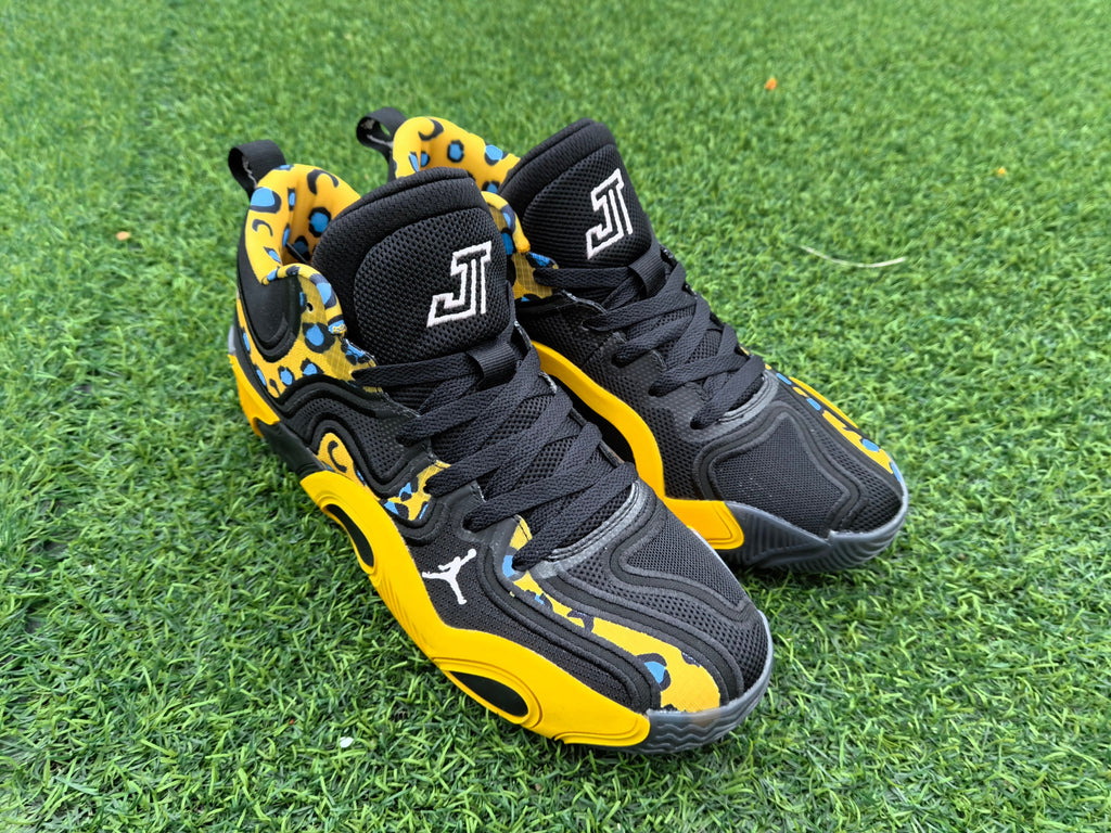 Jordan 680-7 Black and Yellow Leopard Print Sneakers