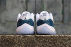 Air Jordan 11 Low Navy Snakeskin Sneakers