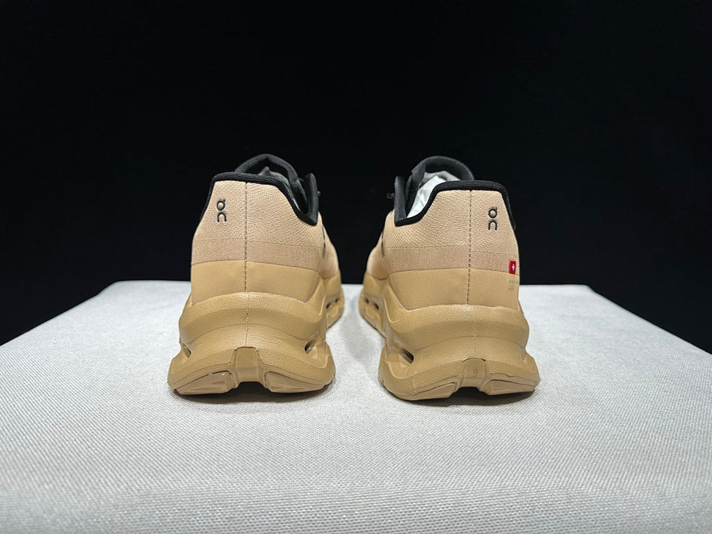 On Cloudtilt Sneakers in Brown and Black