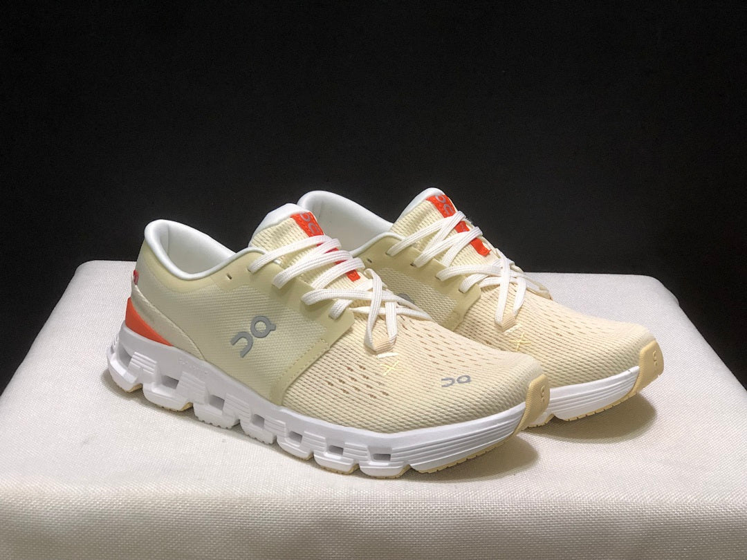 On Cloud X 4 Sneakers in Cream and Orange
