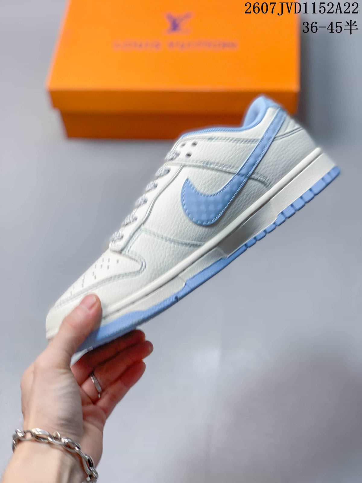 Nike Dunk Low Retro x IP Sneakers White and Light Blue