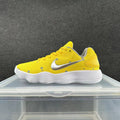 Nike Yellow Low-Top Sneakers with Silver Swoosh