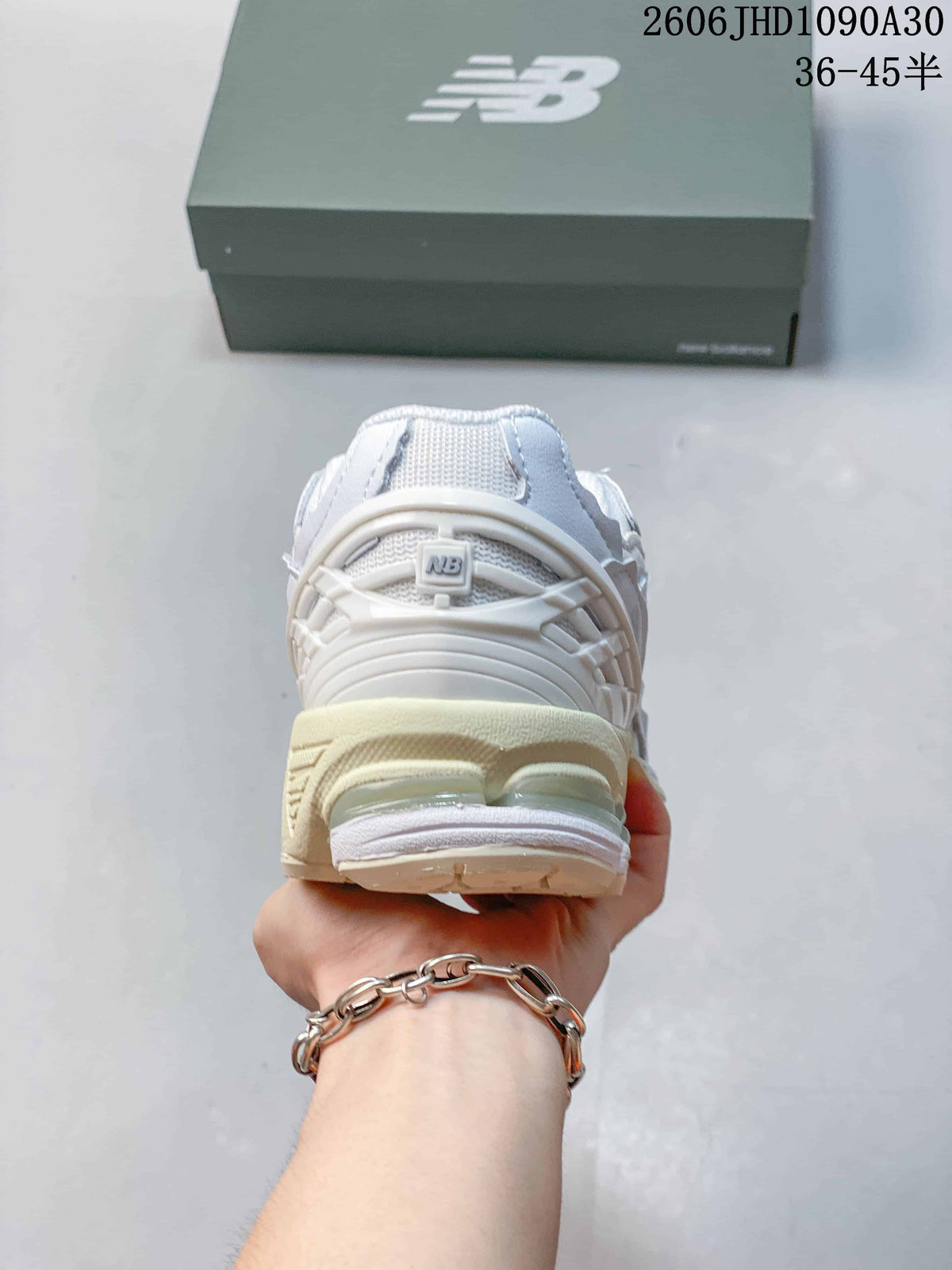 New Balance M1906R Sneakers in White and Silver