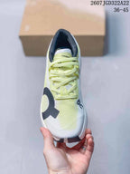 On Cloudboom Running Shoes in Volt and White