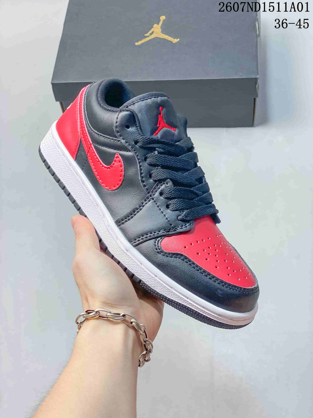 Jordan Air Jordan 1 Low Bred Black and Red Sneakers