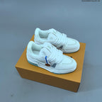 Louis Vuitton Studded Low-Top Sneakers in White and Black