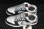 Nike SB Dunk Low Black and White Patterned Swoosh Sneakers