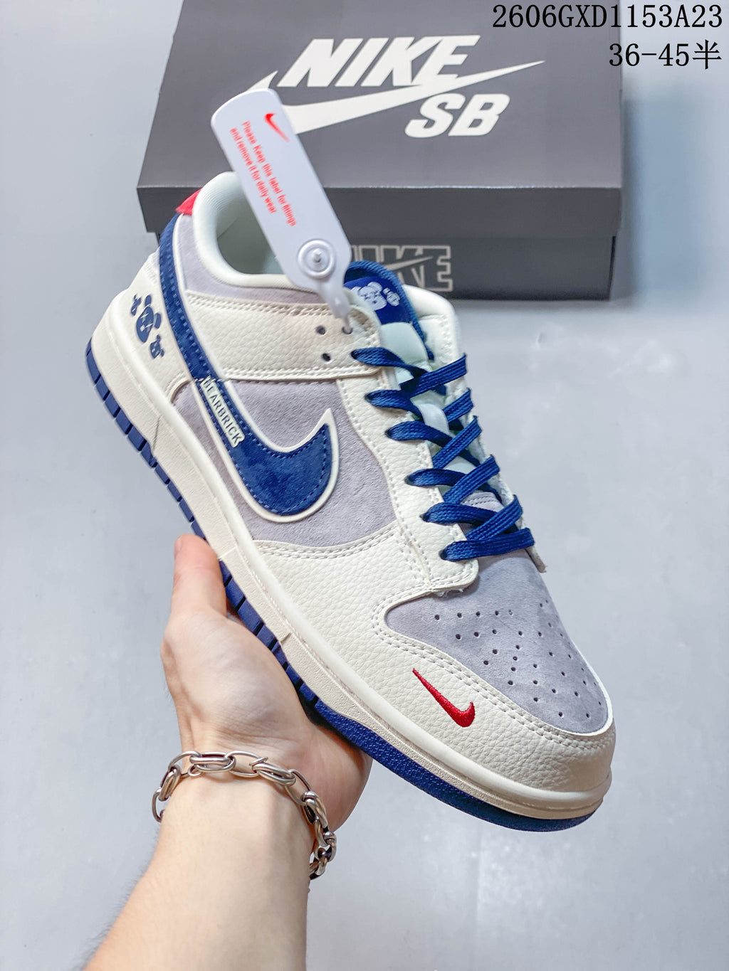Nike SB Dunk Low Bearbrick-Inspired Cream and Blue Sneakers