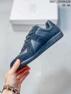 Maison Margiela Replica Wedge Low-Top Sneakers in Black DX003DGR41