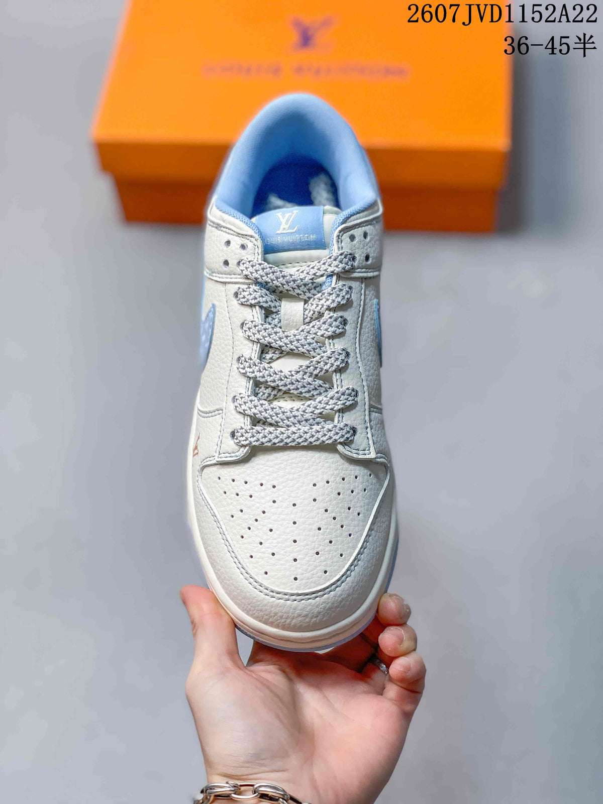 Nike Dunk Low Retro x IP Sneakers White and Light Blue