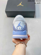 Air Jordan Legacy 312 Low Sneakers in White and Blue