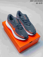 Nike Vomero Running Shoes in Charcoal and Orange