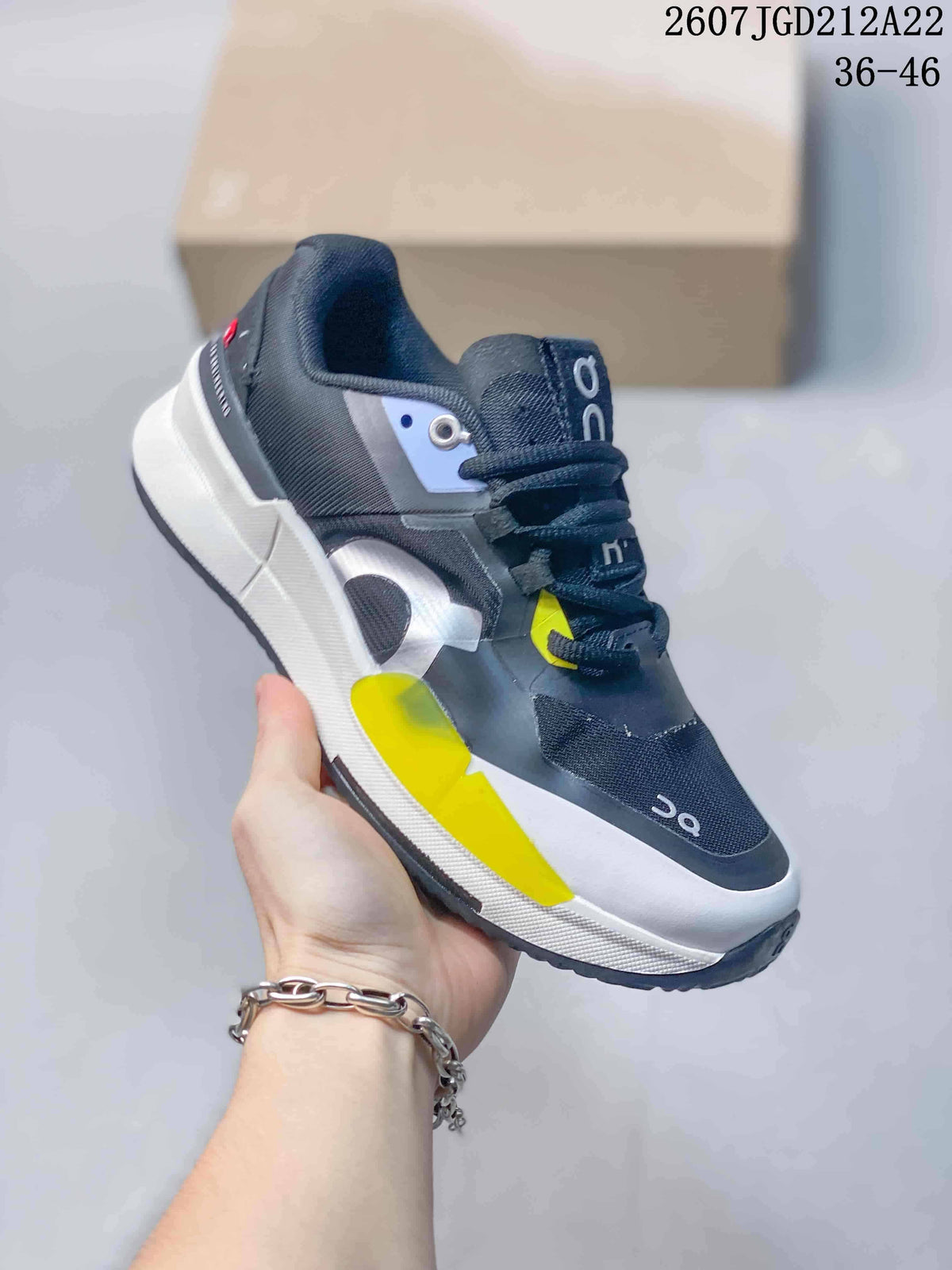 On THE ROGER Pro 2 Tennis Sneakers Black White Yellow
