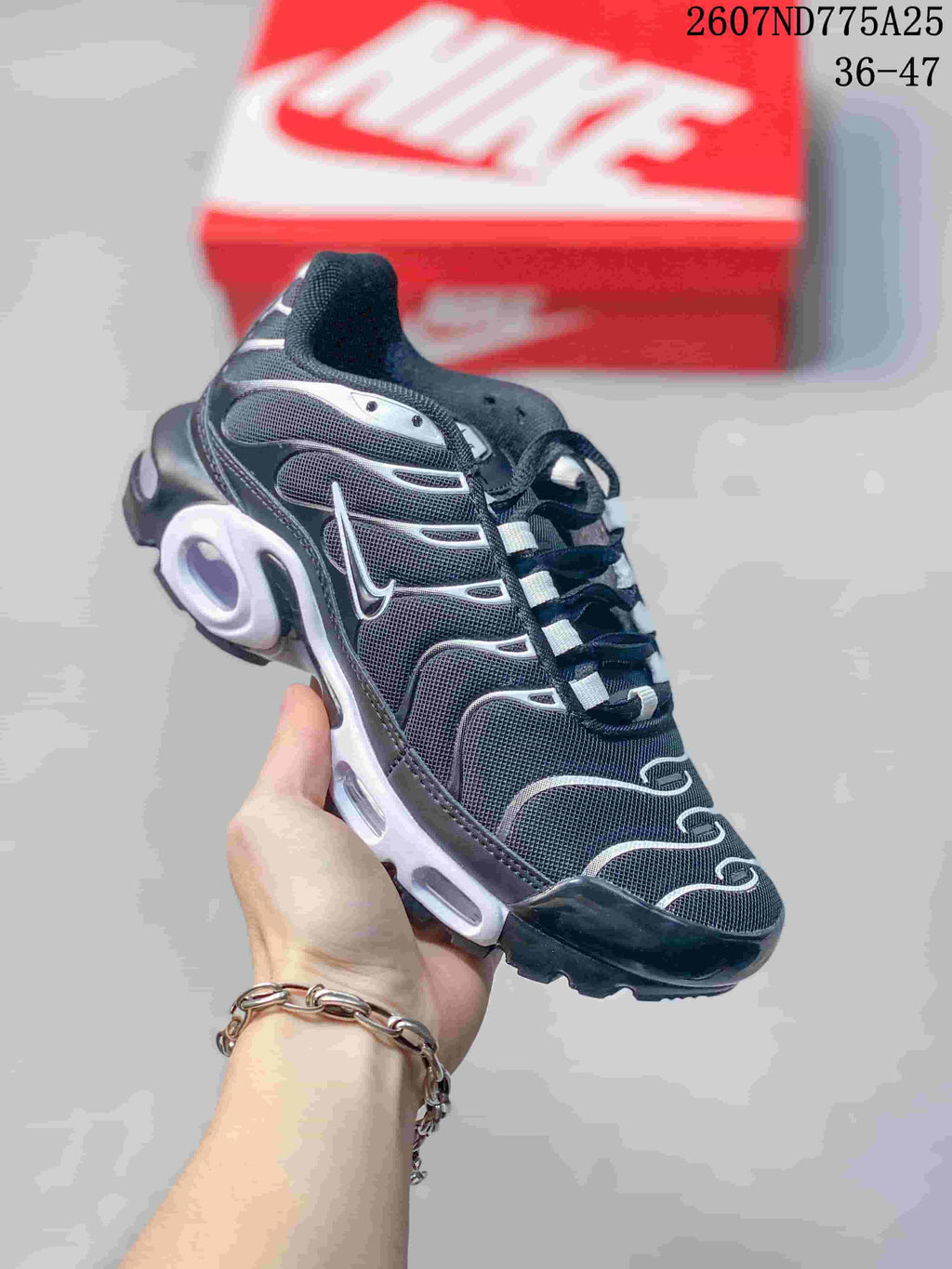 Nike Air Max Plus TN Black and White Sneakers