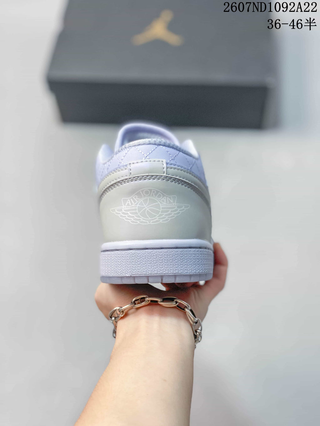 Jordan Air Jordan 1 Low Sneakers in White and Lavender
