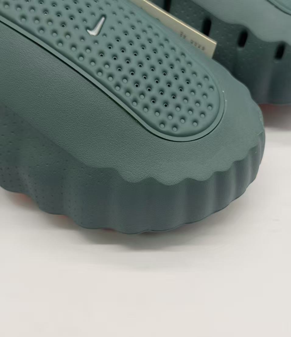 Nike Dark Green Slides with Orange Sole Details